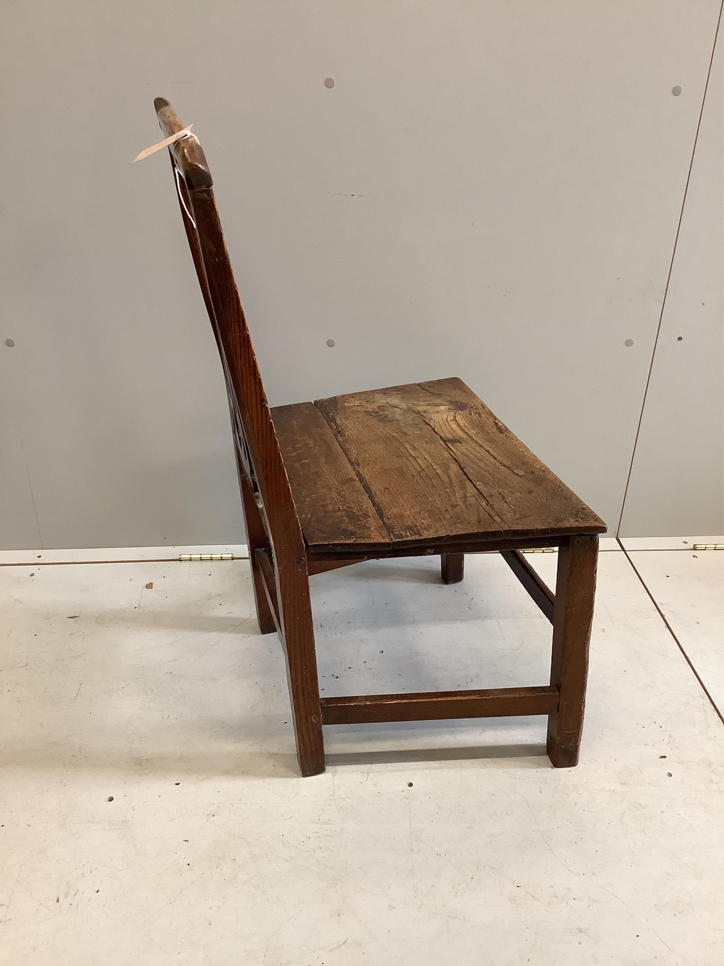 An 18th century circular oak and pine cricket table, diameter 57cm, height 63cm, together with an 18th century oak and fruitwood dining chair. Condition - poor to fair